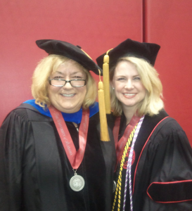 Dr. Marietta Stanton and Dr. Jessica Peck in graduation robes