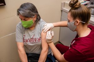 CCN Nursing Student delivers COVID-19 vaccine to Good Samaritan Clinic client