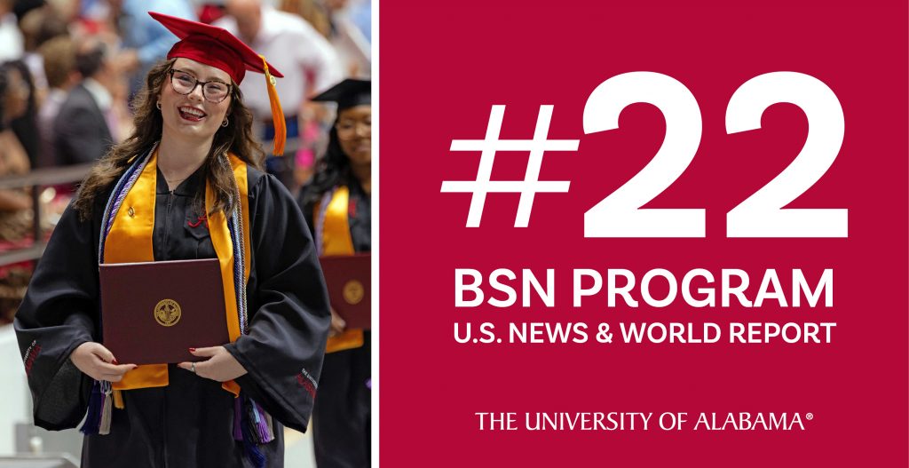 Graduate smiling and holding degree